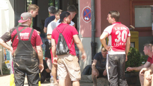 As floodwaters subside in the German town of Erftstadt, people are pulling together to start the cleanup.