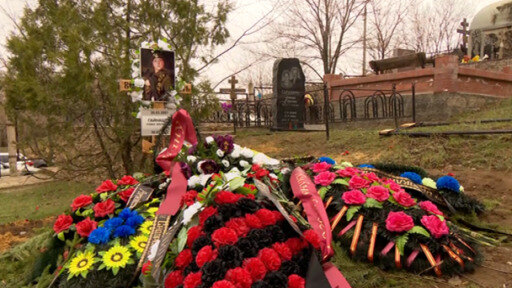 As families bury their dead, Russia tells its people the human cost of war is needed to protect its borders.