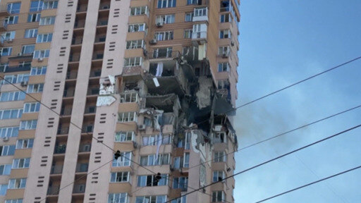 DW visited with those who lived through the earliest attack on a residential building in Kyiv.