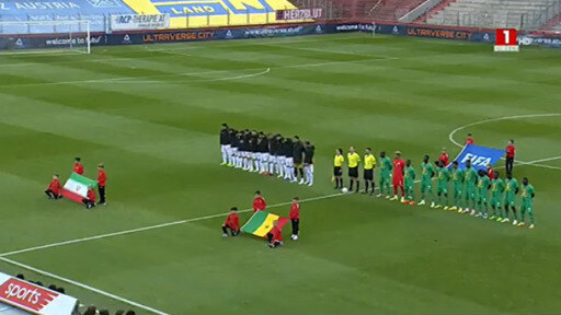 The players covered up their jerseys during the national anthem before their friendly with Senegal. 